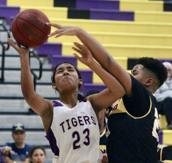Lemoore freshman Jaelyn Proby looks to score in fourth quarter against Fresno High in the first round of playoffs Wednesday night in Lemoore's Event Center.